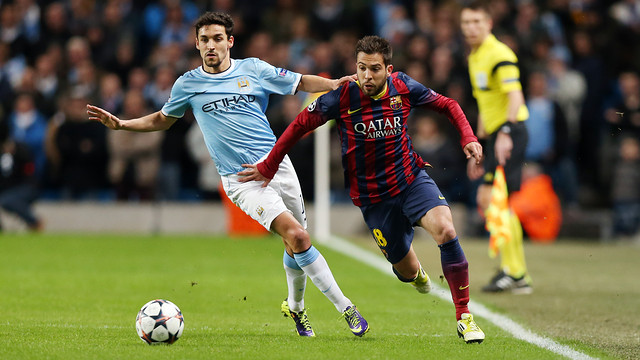 Two players running on the pitch