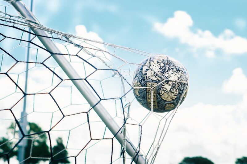 A football hitting the net