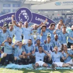 Manchester City celebrate winning the title during the Premier League