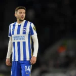 Adam Lallana of Brighton & Hove Albion looks on during the Premier League match between Brighton & Hove Albion and Manchester City