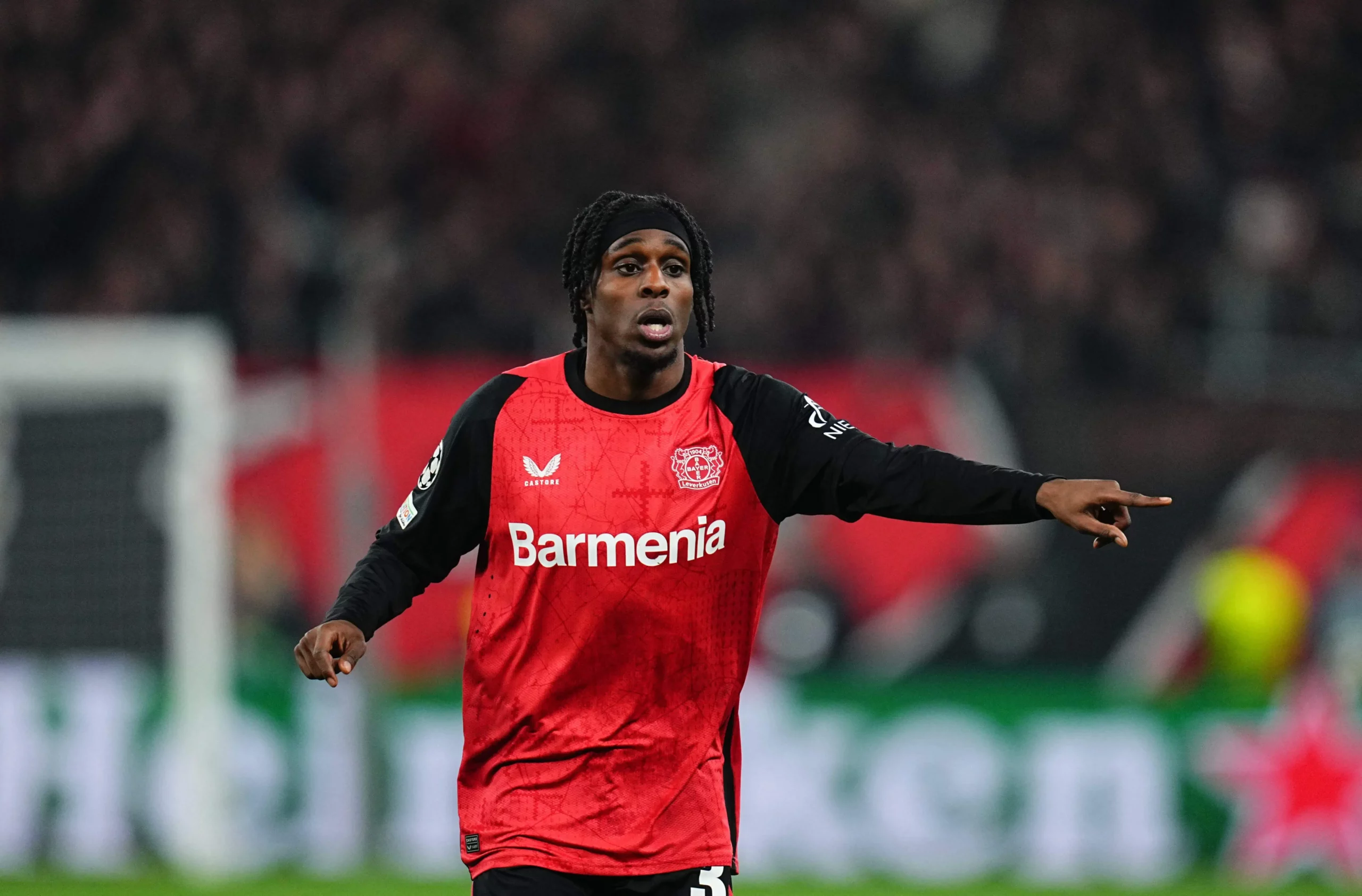 Jeremie Frimpong of Bayer 04 Leverkusen gestures during a Champions League Round of 16 game