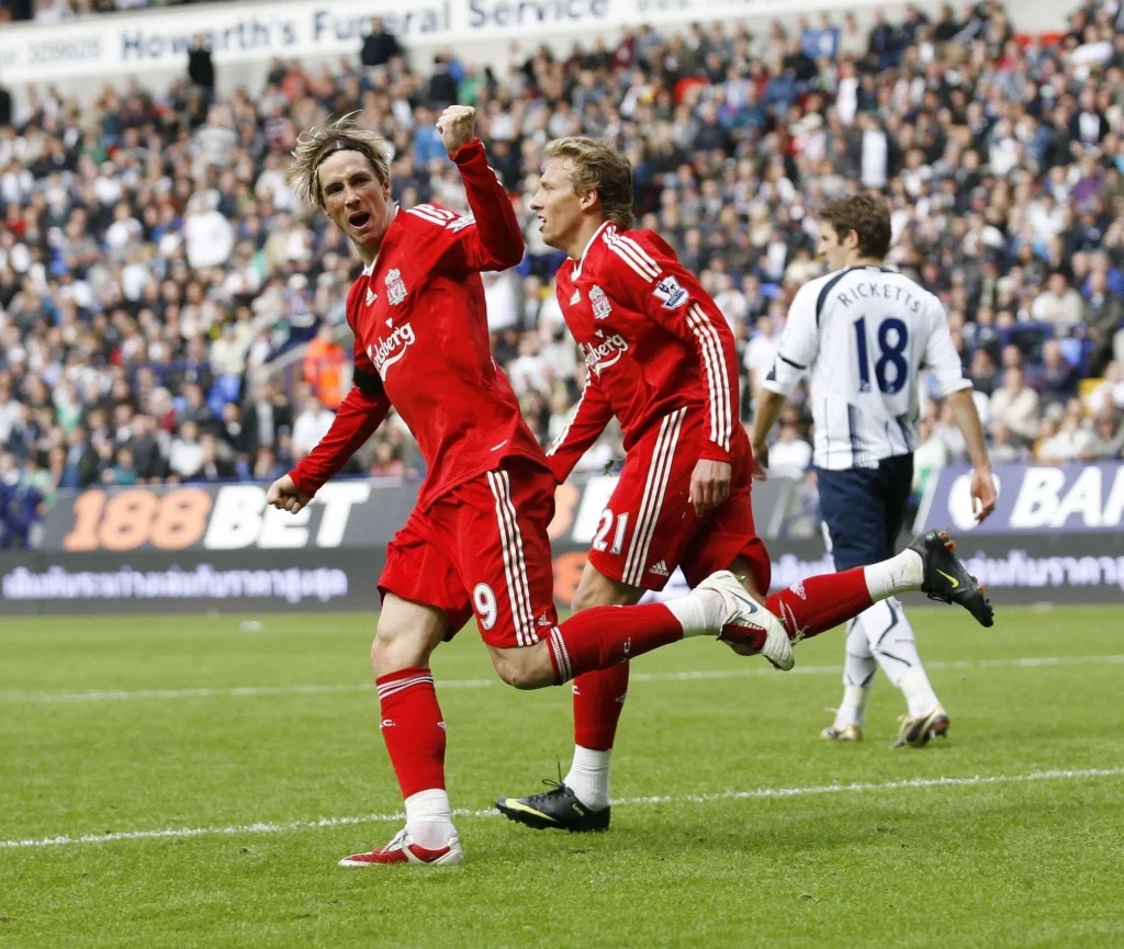 Liverpool's Fernando Torres celebrates scoring his sides second goal